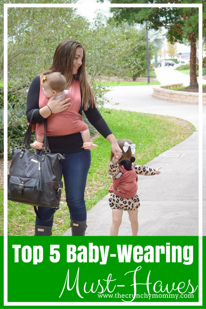 Baby-wearing is probably the most convenient way to parent with littles. While you're wearing your baby, make sure you're properly equipped with these must-haves. 